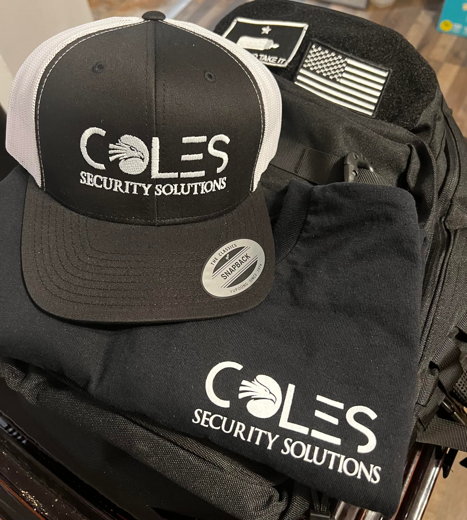 Coles Security Solutions Hat and Shirt